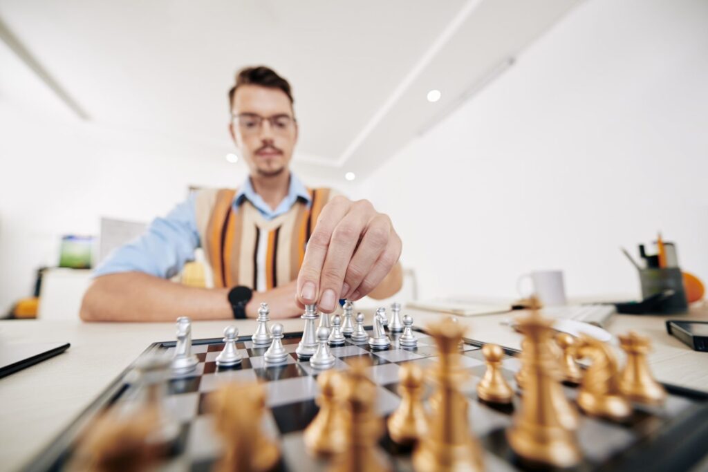 student-playing-chess-e1650355639625.jpg